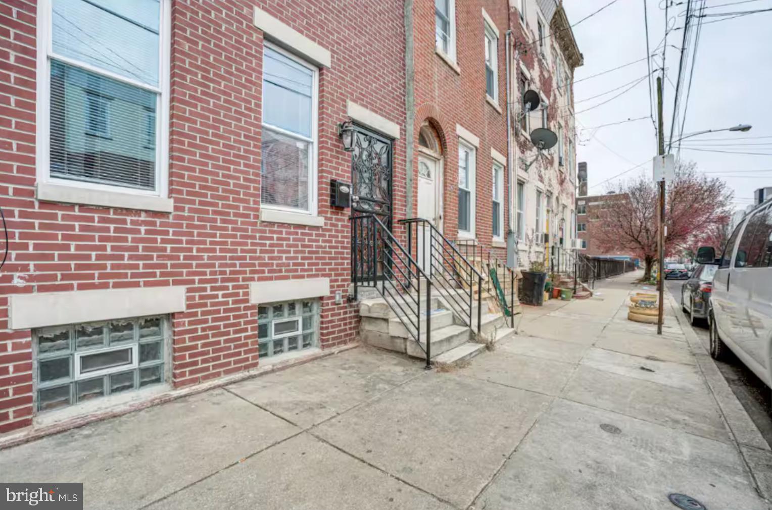 Welcome to 2057 N Franklin St, a spacious and fully updated brick townhouse located in the heart of Philadelphia’s Hartranft neighborhood. This expansive three-story home with a full basement is zoned for multifamily use, offering exceptional flexibility for investors or multi-generational living. Inside, the home features a smart, open layout with five generously sized bedrooms and five and a half bathrooms, providing ample space and privacy for every occupant. The updated kitchen is equipped with all-new stainless steel appliances, and the home is finished with hardwood flooring and modern fixtures throughout. With updated mechanicals and finishes, this property combines reliability with style. Whether you’re looking to live in an oversized single-family residence or use it as a rental, this home delivers space, functionality, and long-term value in one of North Philadelphia’s rising neighborhoods.
