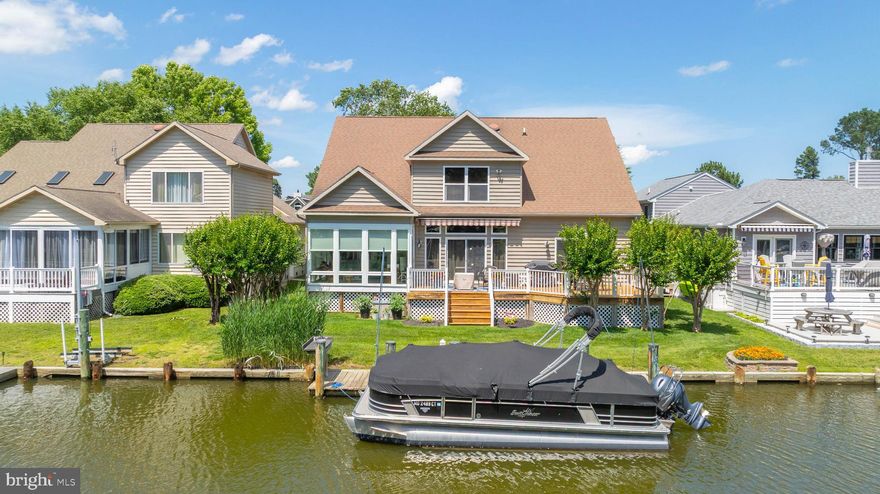 Spacious Waterfront Home with Private Boat Slip in Ocean Pines!
Welcome to this beautifully maintained 3-bedroom, 3.5-bath waterfront gem offering space, comfort, and stunning canal views. Ideally located in amenity-rich Ocean Pines, this home includes its own private boat slip—perfect for boating, crabbing, or simply enjoying the peaceful waterfront lifestyle.

The main level features a more traditional layout with abundant natural light, kitchen with island and a view of the canal, a cozy sunroom, and multiple outdoor decks ideal for entertaining or relaxing by the water. Upstairs, a spacious loft area large enough for a pool table adds extra living or recreation space.

A standout bonus is the finished second-floor guest suite, complete with a kitchenette—ideal for visitors, extended family, or as a potential fourth bedroom.

Additional highlights include a 2-car garage, three full baths, and access to Ocean Pines' incredible amenities including pools, golf, a marina, beach club, restaurants, tennis, and more.

Whether you're looking for a year-round residence, vacation getaway, or investment opportunity, this flexible and inviting home delivers the best of coastal living.