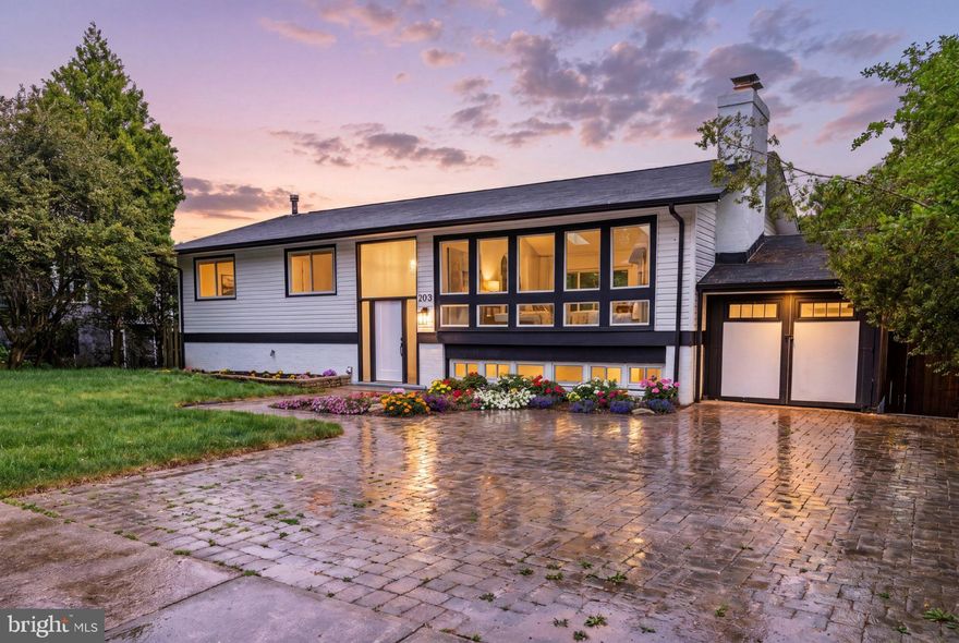 Open House Saturday & Sunday 2–4 PM. 
Refined. Spacious. Effortlessly Vienna.
Welcome to a beautifully reimagined home where comfort, light, and location come together in perfect balance—just minutes from downtown Vienna, parks, and scenic trails.

Set on a generous 0.35-acre lot, 2800 sqft residence has been renovated from top to bottom in a modern, cohesive style. Featuring a brand-new kitchen, fully renovated bathrooms, fresh paint throughout, and beautiful wood flooring, every detail has been thoughtfully updated.

The main level impresses with soaring vaulted ceilings, skylights, and oversized windows that fill the home with natural light. The kitchen is bright and inviting with a skylight above, while the open-concept living space is anchored by a stunning stone fireplace. This level offers 3 bedrooms and 2 full baths, including a primary suite with private access to the deck and backyard.

Step outside to a huge newly built deck overlooking your own private outdoor retreat—fully fenced, surrounded by mature greenery, and complete with a new firepit area, perfect for entertaining or relaxing evenings.

The lower level expands your living space with a large recreation area featuring a second wood-burning fireplace, abundant natural light, 1 bedroom and 1 full bath, plus flexible space ideal for a home office, gym, or additional living area.

This home offers the perfect blend of indoor and outdoor living, modern updates, and privacy—truly a rare find in Vienna.
Don’t miss it—this is the one you’ve been waiting for.