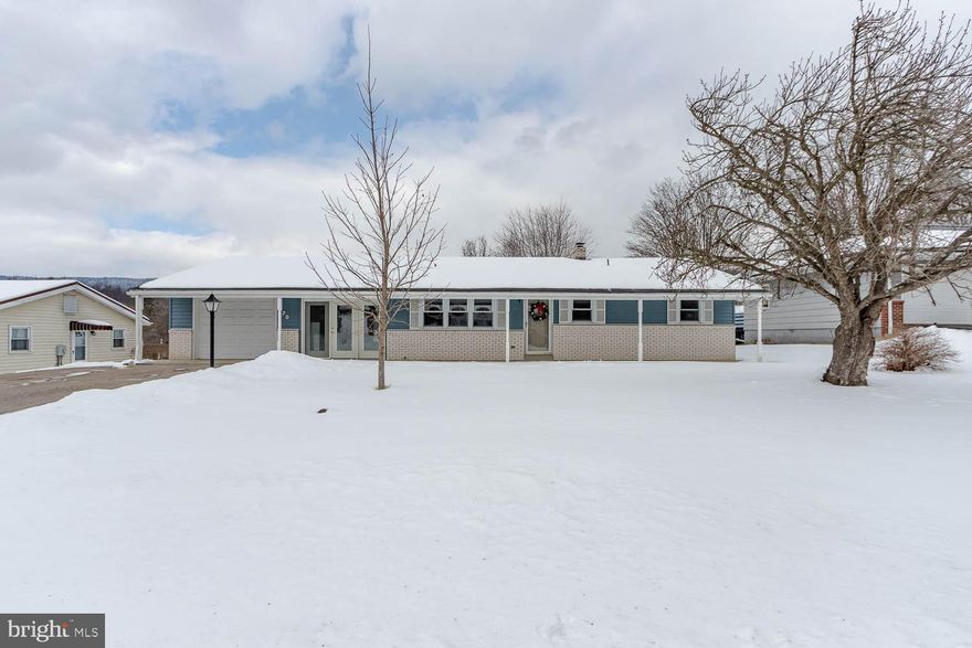 Meticulously maintained and move-in ready ranch in Pleasant Acres featuring beautiful hardwood floors, custom oak kitchen, and the added comfort of central AC—a rare find in this market. The converted breezeway with baseboard heat offers main-level bonus living space with laundry connections and French doors leading to a covered porch and flat backyard. The renovated basement boasts new LVT flooring (replacing original shag carpet), updated lighting, and an added closet, currently serving as a third bedroom, plus additional unfinished space for storage and overflow work space. Oil forced air heat with central AC, one-car attached garage with opener, garden shed, and front/rear covered porches complete this turnkey home. Ideally located close to schools, Geisinger Lewistown Hospital, and US Route 322, with a 30-minute commute to PSU/State College and 60 minutes to Harrisburg.
