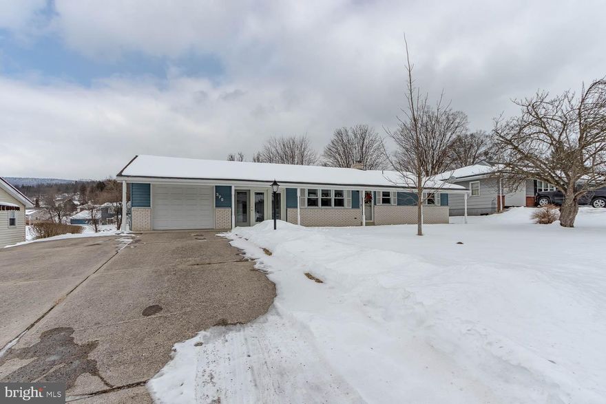 Meticulously maintained and move-in ready ranch in Pleasant Acres featuring beautiful hardwood floors, custom oak kitchen, and the added comfort of central AC—a rare find in this market. The converted breezeway with baseboard heat offers main-level bonus living space with laundry connections and French doors leading to a covered porch and flat backyard. The renovated basement boasts new LVT flooring (replacing original shag carpet), updated lighting, and an added closet, currently serving as a third bedroom, plus additional unfinished space for storage and overflow work space. Oil forced air heat with central AC, one-car attached garage with opener, garden shed, and front/rear covered porches complete this turnkey home. Ideally located close to schools, Geisinger Lewistown Hospital, and US Route 322, with a 30-minute commute to PSU/State College and 60 minutes to Harrisburg.