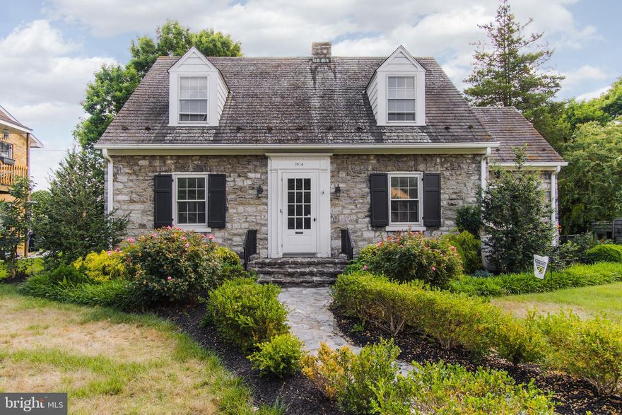 Gorgeous Stone Home.....you always drive by and wonder what it's like inside, well this is your chance to see.  You won't believe the back yard/outdoor spaces, from a huge covered patio with TV, outdoor shower, pizza oven, fish pond, extensive landscaping, gardening beds, it's your own private oasis!    Double Garage in back, and a large concrete parking area - probably fit 4 cars on the concrete parking pad.   

Inside is a gourmet chef's kitchen, tons of cabinetry and concrete counters, one counter is a live edge wood that waterfalls over the side.   At the end of the kitchen is the dinette area - eat in kitchen!  Watch the chef create while dining.   Also on the main level is a half bath, large family room, and a sunroom (the sunroom could also serve as another bedroom if needed one on the main level).  Upstairs are 2 large bedrooms and one full bathroom.  

The basement is "partially finished" with a wine table/area with the exposed stone walls, and other storage and utility areas.  

One of a Kind Home!