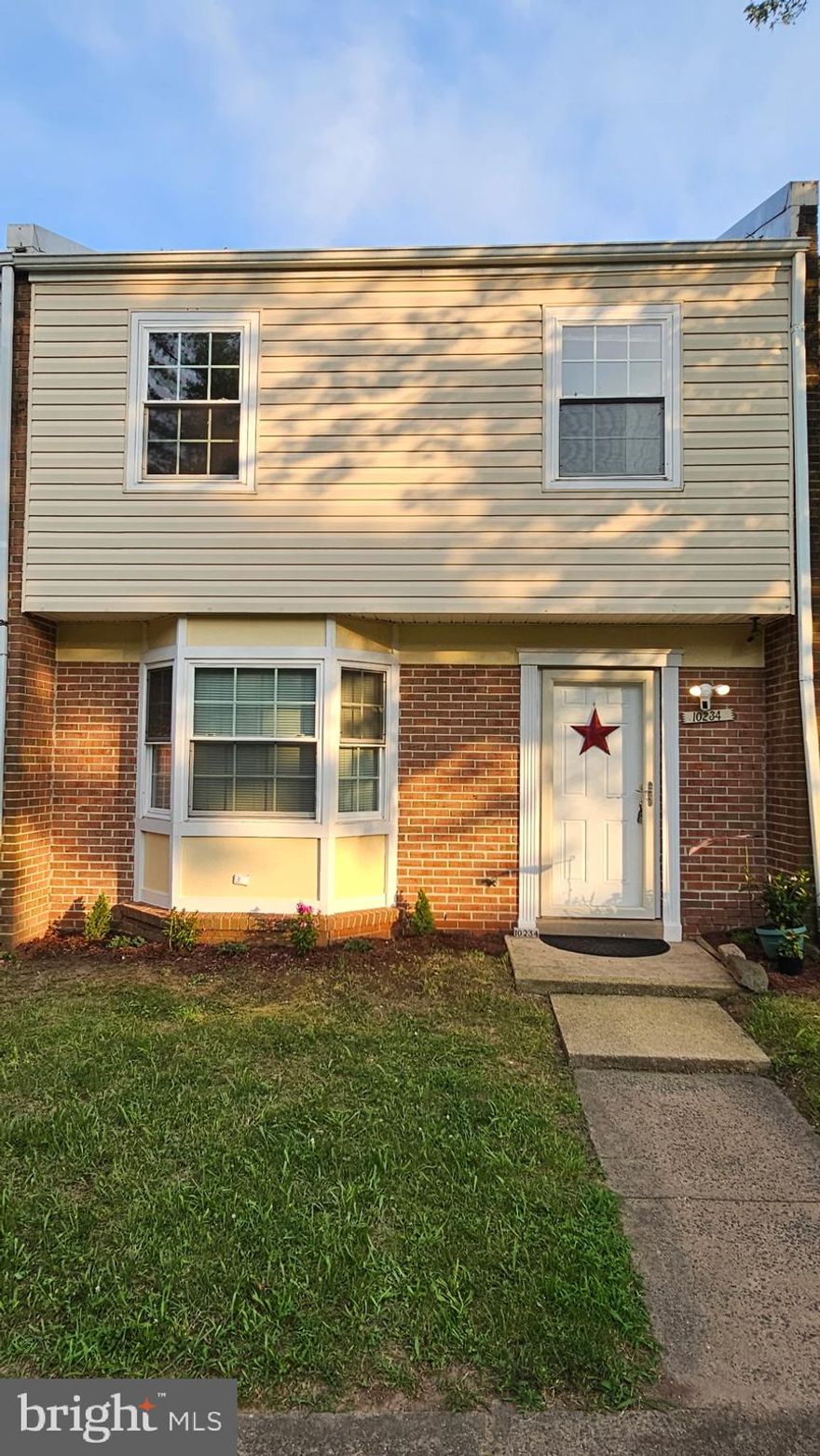 Welcome to your home in Manassas! This delightful colonial-style townhouse in the Irongate II community offers an incredible blend of comfort, convenience, and value. Built in 1976, this well-maintained 1,500-square-foot residence boasts three spacious bedrooms and 2.5 bathrooms, perfect for anyone.

Step inside to discover a beautifully updated interior featuring fresh paint throughout, brand new carpeting, and modern tiled flooring in the kitchen, front hallway, and all bathrooms. Storage worries are a thing of the past with seven generous closets strategically placed throughout the home. Comfort is assured year-round with digital-controlled central air and two ceiling fans, while the 2017 roof replacement and upgraded attic access demonstrate the home's excellent maintenance.

One of this property's standout features is its prime location within the community, facing a welcoming common area where everyone can play and neighbors naturally gather. The private backyard is a highlight, featuring a concrete patio and two storage sheds - one connected to the house with electrical connections, perfect for a workshop or hobby space. The low monthly HOA fees include valuable amenities such as twice-weekly trash pickup, lawn service, snow removal, and a dedicated parking spot with an additional parking pass.

Located in a highly desirable area, this home offers exceptional convenience with easy access to shopping, top-rated schools, and multiple transportation options. Commuters will appreciate being just three miles from I-66, with nearby bus stops and the Virginia Railway Express making Washington D.C. easily accessible. Don't miss this opportunity to own a beautifully updated home in a friendly, well-maintained community.
