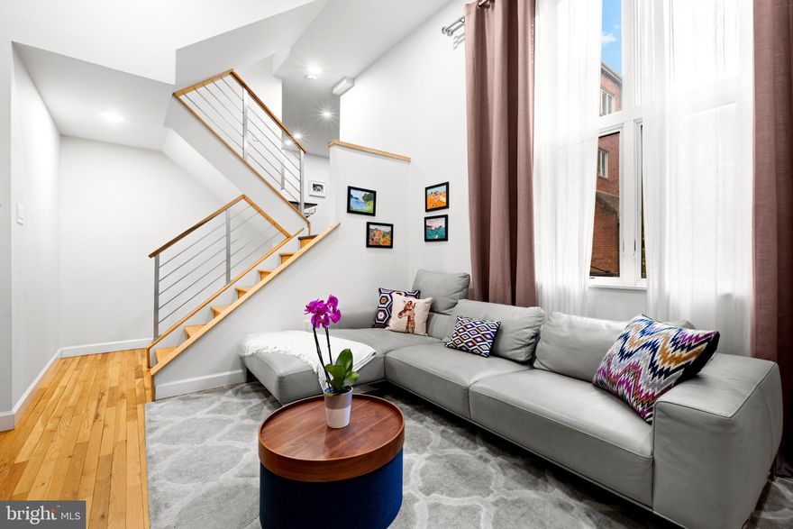 Nestled in one of Queen Village’s most sought-after locations, this exceptional 3-bedroom, 3.5-bathroom home with a den offers a rare blend of charm, comfort, and convenience. Located only steps from exciting restaurants, shops and cafes: Royal Sushi & Izakaya, Lucky's Last Chance, New Wave Cafe, Southwark Restaurant, Bloomsday, Loretta’s & Emmy Squared Pizza just to name a few! A lush, garden-filled front patio welcomes you into this beautifully designed multi-level residence. Imagine BBQing and enjoying time with friends in your private enclosed courtyard. The foyer provides access to a private one-car garage with plenty of storage. A versatile den/ home office space along with ample storage, and a convenient full bathroom is also on this level. The main living area is bathed in natural light, featuring soaring ceilings, hardwood floors, and a cozy fireplace. The spacious dining area seamlessly flows into a modern, renovated kitchen, complete with sleek stainless steel appliances, quartz countertops, and hardwood flooring. On the next level, two well-appointed bedrooms with generous closet space share a full updated bathroom. There is also a half bath on this level with a washer/ dryer. The top floor is dedicated to a serene primary suite, boasting a walk-in closet with built-ins, and direct access to an expansive newly replaced roof deck with breathtaking views. The luxurious en-suite bath features dual marble vanities and an impressive spa-like shower.  As an added bonus, an unofficial space in front of the home is commonly used for parking a second vehicle. Don’t miss this rare opportunity to rent a truly unique home in one of Philadelphia’s most desirable neighborhoods! Two year lease preferred. First Month, Last Month and 1-month security deposit due at lease signing. No pets please.