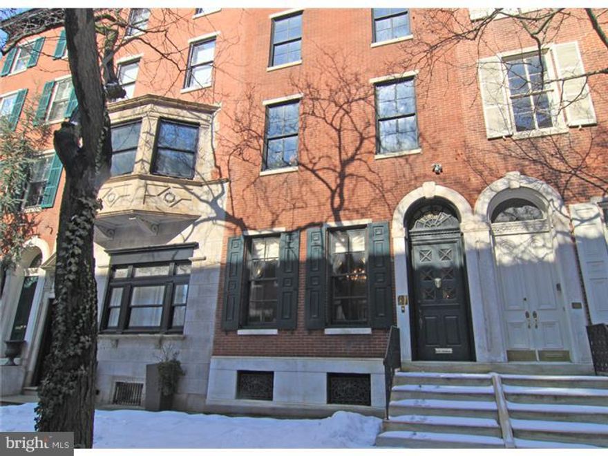 Shine this diamond in the rough and it will sparkle. Best location and wonderful curb appeal can be yours.  Four oversize levels of living plus basement.  The spacious marble floored vestibule opens to the long hallway offering the view of the curved staircase. High arched doorways & ceilings, long windows in the front living room fill the home with light. Admire the beautiful mill work and moldings throughout.  Several gas fireplaces are in the home, some with marble mantels.  The dining room is near entrance to brick fenced in terrace & small garden.  The kitchen is ready to be expanded. The present kitchen is small yet features cherry cabinetry. The heating and central cooling systems are in place. The systems are in need of some care, but central air conditioning infrastructure is built in. Start with more than a clear canvas to create a masterpiece of a home. Opportunity is here, possibilities are endless.