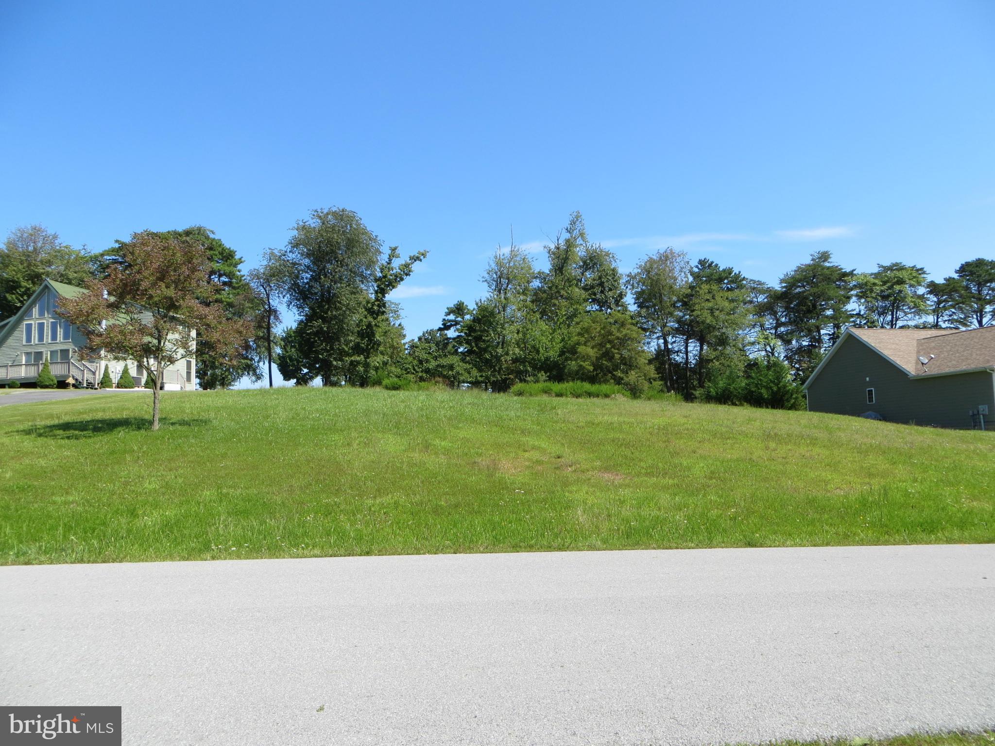 Located on the 10th Fairway of the Mountain View Golf Course with views of the golf course & mountains!! On cul-de-sac street for lots of privacy. Initiation fee of $5350.00 for the Class V (Indoor-Outdoor-Golf) membership will be additional.