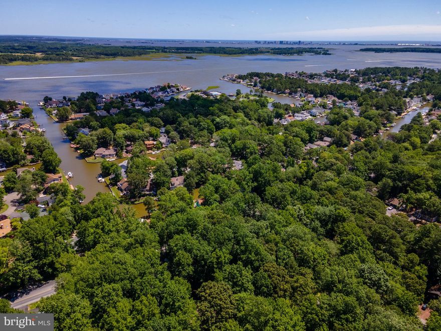 High & Dry Lot in the heart of Ocean Pines, An amenities rich neighborhood with 5 pools, Tennis Courts/ Racquet club, Golf Course & More.  Lots are becoming very limited in Ocean Pines and this lot is large  and next to an outlet which means extra space between you and your neighbor that is a perfect buffer for privacy.