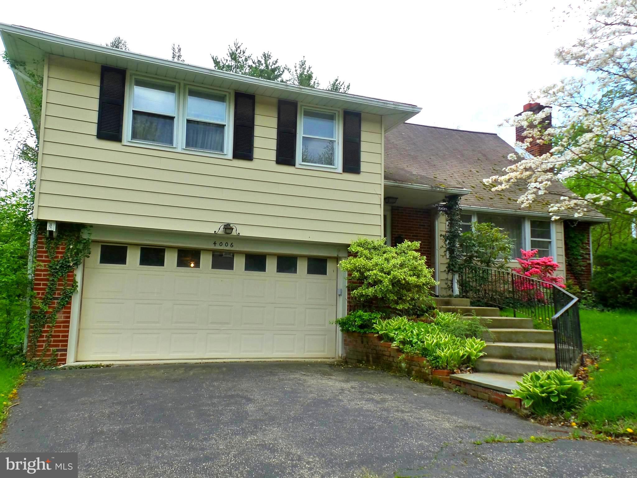 This 4 Bedroom bright home has been lovingly maintained by a long time owner. Close to Chestnut Hill shops & restaurants. High-efficiency air conditioner, newer water heater & furnace, hardwood floors under the wall to wall carpeting. Small cosmetic work will add to the value of this very well maintained good functioning home.  The main level offers a large entry Foyer with coat closet, spacious living area with fireplace & sliders to the patio. Updated eat-in Kitchen with garden window. Plenty of cabinets. The second floor has a large open landing. Master Bedroom has a Bath with shower and walking closet. 2 additional Bedrooms and a Hall Bath. 3rd floor has one large room with Powder rm which can be converted for 2 Bedrooms or Media rm. The Lower Level has an entertainment rm presently a Dining rm. Under the whole house, there is a huge dry basement with a separate entrance from the garage. It is a handy person paradise. The 2 car garage has an electric opener.