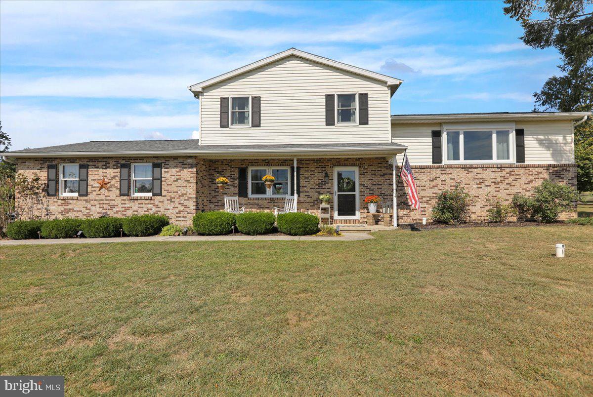 Welcome to this charming home nestled on a country acre with so much to offer. Relax in the spacious family room with a brick fireplace or in the lower level den with a built in bar. Cooking is a breeze in your well appointed eat in kitchen with quartz counter tops and plenty of cabinet space. Your dining room is just the right size for all those holiday dinners. From here you will find French doors that lead to the beautiful two tiered deck. What a perfect place to enjoy a cup of coffee in the morning and enjoy the view of the tranquil rear yard. The primary bedroom has an access door to the hall bathroom and ample closet space. There are two other nice bedrooms. Other features include a attached two car garage, laundry room, newer flooring, and a lawn shed. Come and explore. This well maintained home is just what you've been searching for. Welcome Home! All highest and best offers must be received by 6pm Sunday 9/14/25