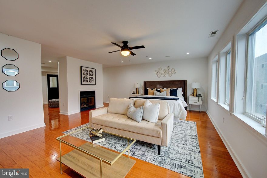 Designer Living in a Private Gated Enclave
1426 Kenilworth Street | Graduate Hospital | 4 Beds | 3 Full + 1 Half Bath | 2-Car Garage | 3 Master  Suites |Rooftop Skyline Views | $50,000 Buyer Customization Credit 

Elevated, flexible, and refined—1426 Kenilworth Street is a rare opportunity to own a luxury townhome in a private gated community just moments from Center City, with over 3,800 square feet of sophisticated living space and a $50,000 credit offered toward your dream customizations.

This architecturally bold, 22-foot wide townhome offers a lifestyle of thoughtful luxury—with a private first-floor mother-in-law suite, fully finished basement with soaring ceilings, and an expansive floor plan ideal for multigenerational living, entertaining, or work-from-home flexibility.

First Floor: Private Guest Quarters + Oversized Basement

Step through the contemporary black-glass front door into a dramatic entryway adorned with sleek porcelain tile flooring. This level hosts a private guest suite with full bath, ideal for a mother-in-law, au pair, or extended-stay visitors—offering privacy and comfort away from the main living areas.

At the rear, a two-car garage with EV charging, plus access to a massive, fully finished basement—perfect for a home gym, theater, game room, studio, or wine cellar. With extra ceiling height and open space, the possibilities are limitless.

Second Floor: Bold Entertaining & Designer Kitchen

The second level serves as the home’s entertainment hub, where a grand living room with oversized windows flows into a chef’s kitchen that’s as functional as it is striking:

Black quartz waterfall island and full slab backsplash

Sub-Zero refrigerator and professional-grade six-burner range with hood

Pot filler, stainless dishwasher, and abundant storage

Walk-in pantry, powder room, and a bonus rear terrace for morning coffee or evening wine

The sun-soaked formal dining area comfortably seats 8+ guests, surrounded by windows for natural light all day long.

Third Floor: Owner’s Sanctuary + Second Bedroom

Upstairs, the primary suite is a retreat within a retreat—complete with a fireplace, custom walk-in dressing room, and a spa-inspired bathroom featuring a freestanding soaking tub surrounded by natural light, dual vanities, and a walk-in glass shower.

A second bedroom on this level is perfect for a nursery, home office, or guest room, adding even more flexibility to the layout.

Fourth Floor: Skyline Views + Rooftop Luxury

The top floor features two generous bedrooms (easily converted into a large suite), a stylish full bathroom, laundry area, and access to a rooftop deck with panoramic Center City views—a perfect setting for outdoor dining or a rooftop garden.

Property Highlights:

4 Bedrooms | 3 Full Baths + 1 Half Bath

Private guest suite on entry level (mother-in-law suite)

Massive finished basement with high ceilings

$50,000 credit toward buyer customization—use for upgrades or finishes

Skyline rooftop deck + rear terrace

Gated community with two-car garage and EV outlet

Designer finishes, black quartz kitchen, hardwood floors throughout

Luxury, location, and flexibility come together in this rare Graduate Hospital townhome. Whether you’re expanding, downsizing with style, or seeking multi-suite functionality, this home offers the space, privacy, and polish to fit every chapter of life.

🔑 Schedule a private tour today—and design the luxury experience you deserve with your $50,000 credit.