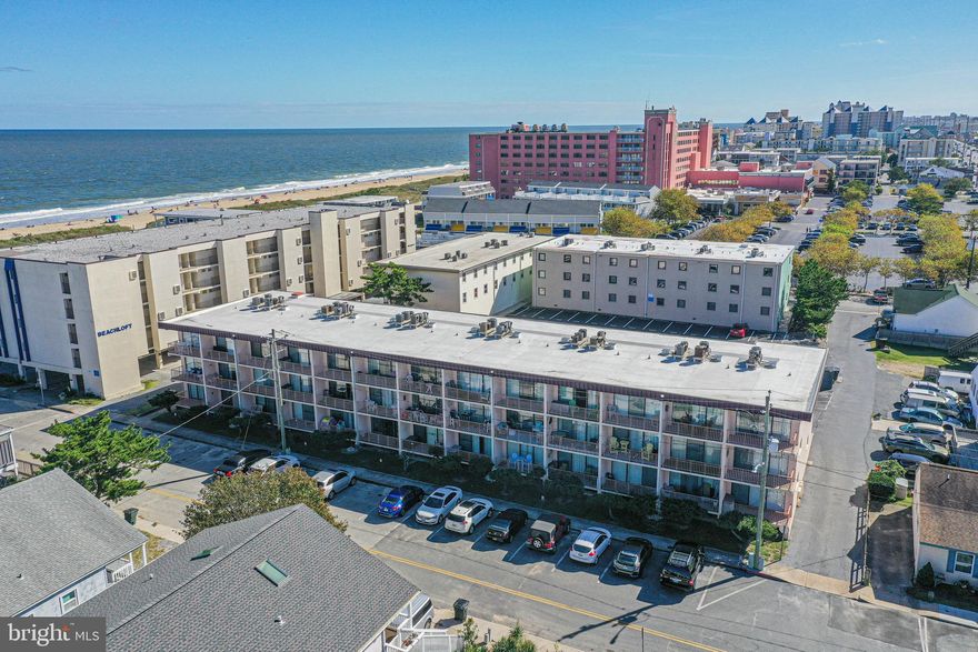 Clean 1 Bedroom Ocean Block Condo/ 2nd Unit from east end of the building.  Masonry Construction.  Mid Town Location with parking behind buiding.