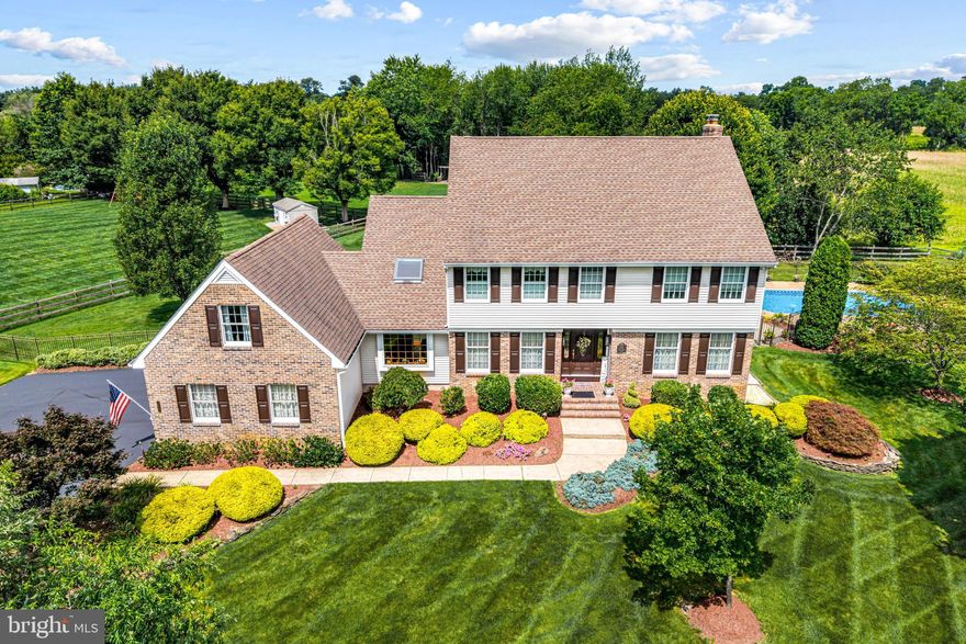 Finally, your dream home has come on the market! Everyone loves the Ridings of Southampton. 4-6 bedrooms, 2.5 baths, 3 car garage, inground pool, 1 acre lot on a cul-de-sac, full basement that is partially finished, hardwood floors, main floor office, grand primary suite with sitting room, new roof 2014, bonus room over the garage, back up generator, multi zone gas heat, central air, all appliances included, walk in attic storage, bright and neutral. A stately colonial set back from the road with a paved driveway leading to the side turned 3 bay garage, providing plenty of parking. Follow the walkway to the formal front entry with decorative brick steps and front door flanked by glass panels. Step into the foyer with beautiful hardwood flooring, coat closet, turned staircase to the upper level. The living room has floor to ceiling windows overlooking the front yard and lush wall to wall carpeting. The formal dining room has custom woodworking with chandelier and easy access to the kitchen. A spacious updated kitchen with quartz countertops, ceramic backsplash, beautiful wood cabinetry, double wall ovens, built in corner cook top with built in microwave above, all Kitchen Aid stainless steel appliances, refrigerator/freezer, built in dishwasher, and double stainless sinks with pull out swan neck faucet. The kitchen overlooks the breakfast room with sliding glass doors opening to the deck and pool. Located off of the kitchen and breakfast room is the family room with a brick fireplace, wood mantle, custom built in storage/cabinetry area, and slider doors to the deck. Also on the main level is a home office with vaulted ceiling, sky light, circular staircase to the main bedroom, and balcony views from the main bedroom sitting room. An updated powder room, and  laundry room with washer, dryer, utility sink, cabinetry storage, and access to the garage. There is also an entry door to the backyard in this area of the home, making it perfect for pool goers. A turned carpeted staircase with updated railings leads to the upper level with 4 bedrooms and 2 full baths. Double door entry to the main bedroom suite with 2 walk in closets, dressing area with vanity, updated bath with vaulted ceiling with sky light, double sink vanity, and oversized frameless shower stall.  Off of the bedroom is a sitting room with sky light and balcony view to the lower level. Bedroom 4 has a double wide closet with spiral staircase to a large loft area, and easy access to the attic. Bedrooms 2 and 3 also have wall to wall carpeting, ample closet space, ceiling fans, and share the hall bath with tub/shower combo, and a double sink vanity with plenty of storage. This home also boasts a full basement that is partially finished with a media room, exercise room, a tons of storage.  As amazing as this home's interior may be, it is the exterior where you will be all summer long. A Trex deck spans the back of the house providing numerous sitting, eating, and lounging areas. And with a Sun Setter motorized retractable awning, it's easy to get out of the sun.  Step down to the stamped concrete patio that surrounds the inground pool.  The entire backyard is fenced in and the pool area has separate fencing, making it easy to keep the two areas apart.  Enjoy the privacy this home affords, while still enjoying neighborhood living. An easy drive to the shore or the city, this home is perfectly located. Go ahead! Jump in the pool!