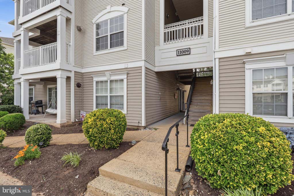 Photo of 11009 Kinship Court #102, MANASSAS, VA 20109 (MLS # VAPW2121632)