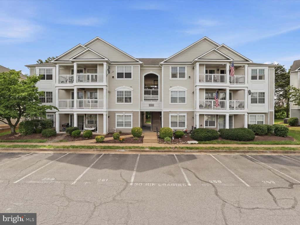 Photo of 11009 Kinship Court #102, MANASSAS, VA 20109 (MLS # VAPW2121632)