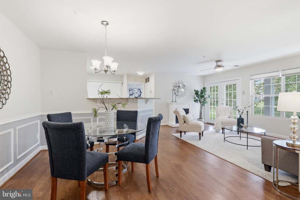 Photo of 11009 Kinship Court #102, MANASSAS, VA 20109 (MLS # VAPW2121632)