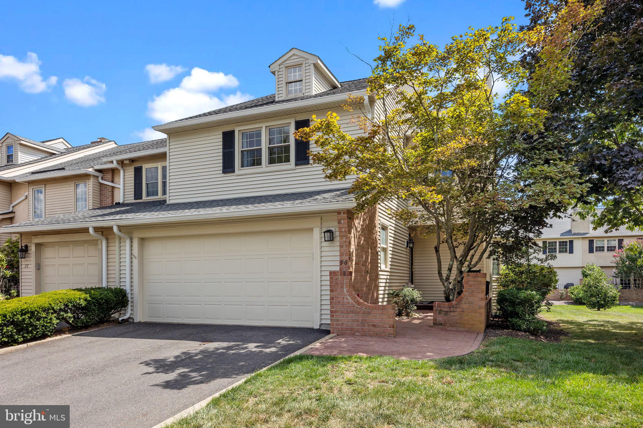 Welcome home to 96 Sutphin Pines in Yardley, PA.
Situated at the back of a cul-de-sac on the edge of the community, this brick end-unit townhome with a two-car garage offers a private and quiet setting within one of Yardley’s most desirable neighborhoods. Sutphin Pines is a community of just 98 residences, celebrated for its beautifully landscaped surroundings and meticulously maintained common areas. Residents enjoy a refined, maintenance-free lifestyle with a sparkling saltwater pool, tennis/pickleball courts, and lovely walking trails throughout the neighborhood.
The entrance to this home begins with a private brick walkway leading to a welcoming front porch—perfect for enjoying your morning coffee. Inside, a grand curved staircase sets the tone for the home’s bright and airy design. Hardwood floors flow throughout, and the updated kitchen overlooks open space, and the community tennis courts beyond. The living room is warm and inviting, featuring an electric fireplace and elegant French doors that open to a large private brick courtyard with a brand-new paver patio. This outdoor space is ideal for entertaining or relaxing in complete privacy.
Upstairs, three spacious bedrooms and two baths provide comfort and style. The primary suite offers a large walk-in closet plus two additional closets, as well as an updated en suite bathroom with a large vanity. The two additional secondary bedrooms also feature generous closet space. For even more flexibility, there is an option to add a staircase and finish the third-floor loft, creating an additional 550+ sq ft of living space. The loft already includes built-in closets, making it a perfect option for a home office, studio, or guest suite.
A second open, curved staircase leads to the large, finished basement, with a cozy wood-burning fireplace and wet bar. There is also a large laundry room with cabinets and counter space. The basement has additional space for storage.
The exterior has been updated with brand-new siding and a new garage door, while the HOA covers the roof, gutters, lawn care, landscaping, snow removal, and trash service—ensuring a truly carefree lifestyle.
Beyond your doorstep, enjoy walks or bike rides along the nearby Delaware Canal Towpath, explore charming Yardley Boro, or take advantage of the home’s unbeatable convenience. Located in Lower Makefield Township within the award-winning Pennsbury School District, Sutphin Pines is just minutes from shopping, dining, and major commuting routes with rail access to Philadelphia, Princeton, and New York.
This move-in-ready home perfectly blends elegance, convenience, and low-maintenance living in one of Yardley’s most sought-after communities.