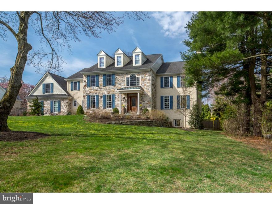 * REAL ESTATE TAXES UNDER APPEAL * Nestled on a quiet street, this exquisite estate in Gladwyne stands grandly amid lush landscaped grounds on a sprawling level lot. Experience the elegance of a finely-crafted, impeccably-maintained manor home that enjoys a prime location minutes from the highly-regarded Philadelphia Country Club & other amenities. A flagstone walkway winds to an elegant covered entrance. Greeting you inside is an impressive 2-story reception hall with Brazilian cherry floors throughout the main level, a turned staircase, & Palladian window that brightens the ambience. Double doors & tasteful moldings frame the entrance to the wainscoted dining room with recessed lighting & remote dimming. A similar entryway leads into the formal living room w/ a gas fireplace, perfect for entertaining. The adjoining library offers custom built-ins, paneled detailing & a window w/ scenic views. Glass-paneled doors open to the family room through a hallway w/ a coat closet & half bath. The open flow between the kitchen, breakfast room & family room keeps everyone connected & extends to the rear flagstone patio via glass-paneled doors. The gourmet kitchen is a dream setting for all to gather with a huge center island, Yorktowne cabinetry, granite countertops & top-name appliances. The vaulted family room is lovely & light-bathed w/ massive windows overlooking greenery & a floor-to-ceiling stone fireplace. A mudroom accesses a walk-in pantry, powder room & 3-car attached garage. Main & rear stairs ascend to the 2nd story enriched by oak wood floors. Five spacious bedrooms, 3 w/ en-suite baths, one hall bath, & laundry. The private master retreat has a fireplace, walk-in closet, sitting room & deluxe bath w/ dual vanities, Whirlpool tub & frameless glass shower. A day-lit walkout lower level presents a finished rec room, full bath & an unfinished area for storage/mechanicals. Central vacuum, a sophisticated alarm system, & irrigation system are added bonuses. Close to the heart of Gladwyne & Rtes. 76/476.