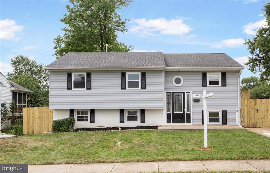 Don't miss this updated gem! Move in ready home with bonus spaces!  This four bedroom two bath house is ready to welcome you home.  Enjoy your granite countertops in your updated kitchen with stainless steel appliances.  Drink your coffee or tea in the screened in sunroom attached to the  dining room.  Lots of sunlight with new windows in the living room.  Fresh new carpeting throughout.  Upstairs bath is has been freshened up.  The basement offers a large bedroom , family room and full bathroom with shower.  There is also a separate room for the washer and dryer.  Enjoy your privacy in the fully fenced in back yard ready to make it your own.