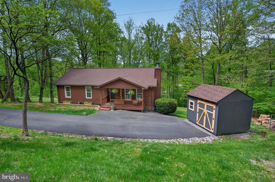 Welcome to this beautifully appointed 3-bedroom, 3-bath residence offering the perfect blend of comfort, style, and family-friendly living. The main level showcases a thoughtfully designed open-concept layout, seamlessly connecting the kitchen, living, and dining areas—ideal for both everyday living and effortless entertaining. With attention to detail and convenience throughout, this inviting space is filled with natural light and designed to bring people together.

The recently renovated lower level adds exceptional versatility, featuring a spacious family room perfect for movie nights, play space, or extended living, along with a fully updated third bathroom for added comfort and functionality.  Plus the basement has 2 multipurpose rooms to use as office space or extra bedrooms.

Upstairs, generously sized bedrooms provide peaceful retreats, while the home’s flexible layout offers room to grow and adapt to your lifestyle.

The back yard feels like a thoughtfully designed kids' play space that blends into the woods-part play ground-part zip line-part little retreat.

Nestled in a welcoming setting just minutes from Front Royal.  Ideally located near the Appalachian Trail, Shenandoah National Park, Skyline Drive, and the Shenandoah River.   This home offers a rare opportunity to enjoy the best of outdoor adventure while still savoring the comfort and warmth of home—an ideal setting for making lasting memories.