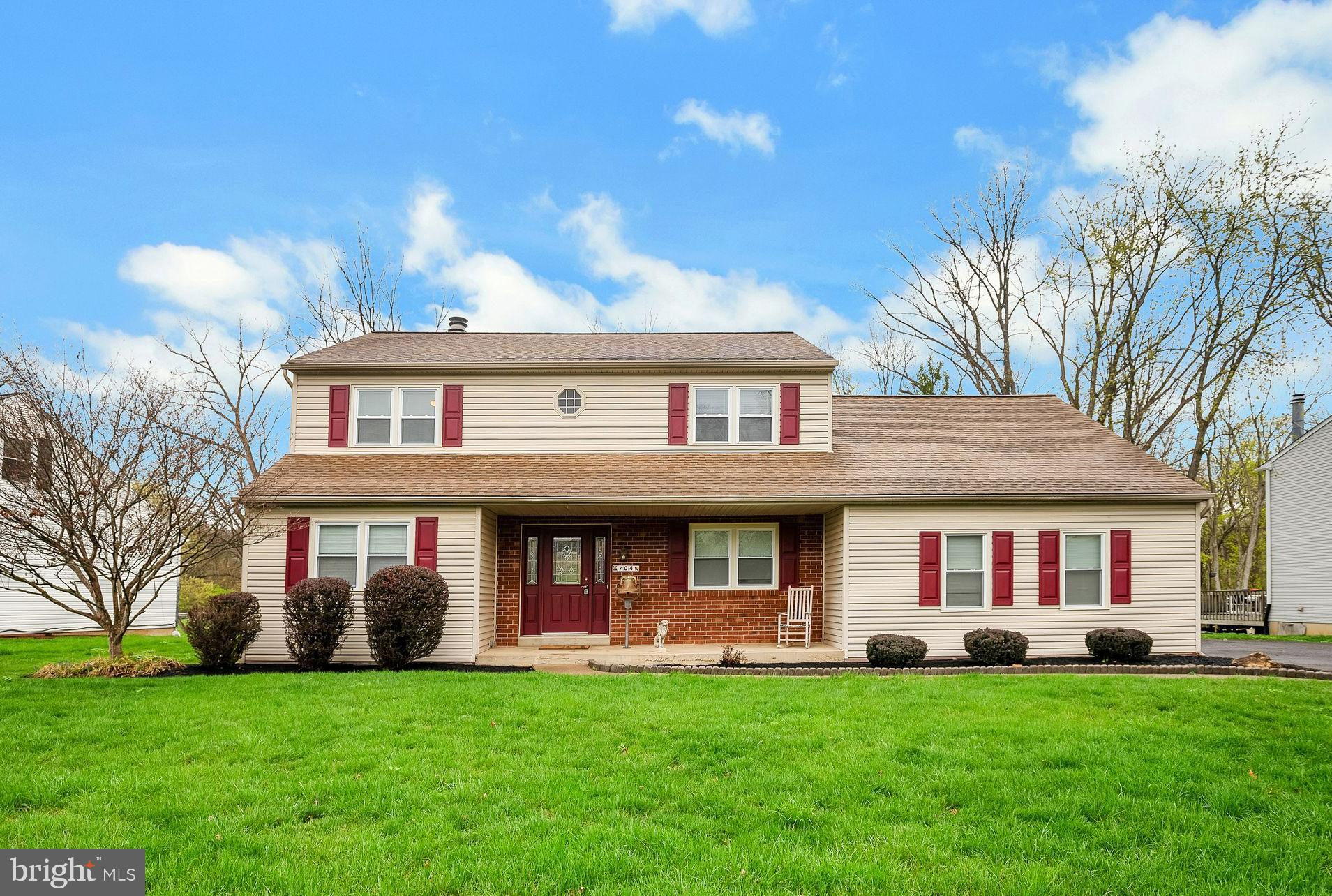 Welcome to this beautifully maintained 4-bedroom, 2.5-bath custom Colonial nestled on a gorgeous, private lot in highly desirable Upper Dublin Township. This is the only home in the community featuring a side-entry 2-car garage—just one of the many custom details that make this property truly special. Step into the welcoming foyer with tile flooring, flanked by a formal living room—perfect as a home office—and a formal dining room featuring hardwood floors, crown molding, and chair rail, ideal for holiday gatherings and family dinners. The updated kitchen will delight the chef in the family with its abundance of cabinets, quartz countertops, tile backsplash, plank flooring, stainless steel appliances, pantry closet, and a triple window that fills the space with natural light. The adjoining family room boasts a custom fireplace with marble surround and French doors leading to a large deck—perfect for relaxing or entertaining while overlooking the yard with views of the woods. A spacious laundry/mudroom offers excellent storage, room for cubbies, and access to both the garage and rear yard. A recently updated powder room completes the main level. Upstairs, the primary suite is a peaceful retreat with a luxurious en-suite bath featuring a large, tiled stall shower and marble-top vanity. Two additional bedrooms are generously sized, and the fourth bedroom is enormous, complete with an adjoining flex room—ideal for a second home office, playroom, or a future walk-in closet. You'll also find under-eaves storage for all your seasonal items. The finished basement is made for entertaining with a large recreation room and built-in bar area—perfect for hosting game nights or casual gatherings. This exceptional property backs to woods for ultimate privacy and is just minutes from top-rated schools, parks, swim and country clubs, shopping, dining, public transportation, and the PA Turnpike. Lovingly maintained by the original owner, this home is truly move-in ready and waiting for its next chapter. Don’t miss your opportunity—schedule your showing today!