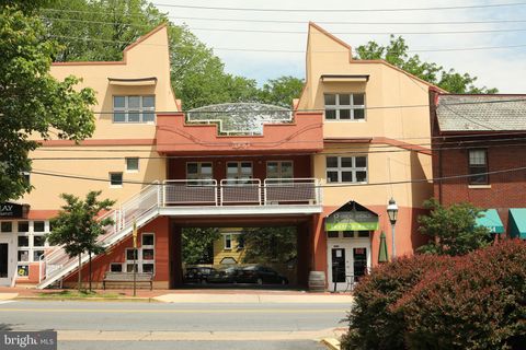 Photo of 7050 Carroll Avenue #202, TAKOMA PARK, MD 20912 (MLS # MDMC2213948)