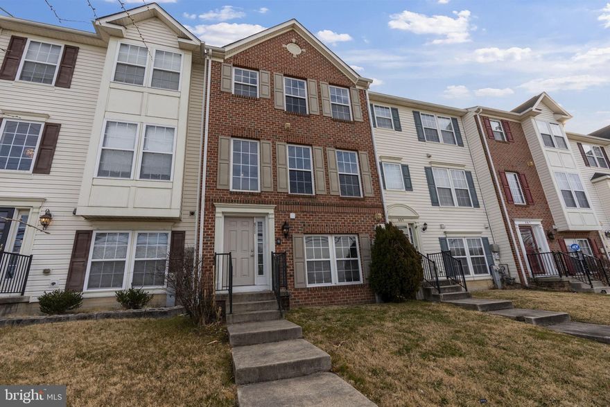 This is an excellent opportunity to restore, update and build equity in an expansive townhome in Miramar Landing. This home is in a super convenient location in Baltimore County and has 3 finished levels, 4 bedrooms, 3.5 baths and a 2-car attached garage. The open and bright main level has abundant living and entertaining space. The living room overlooks the foyer staircase, has wood floors and an adjacent half bath. The kitchen and dining area feature a corner gas fireplace, island, pantry and sliding doors to the private deck. The upper level has a large primary suite with attached bath, a hallway bath and 2 additional bedrooms. The lower level has a 4th bedroom with attached bath, laundry room and access to the garage. Plentiful storage and natural light throughout. Solar panels on the rear roof provide energy savings. There is also driveway parking outside the garage. This home is being offered in as-is condition and a great find! Schedule a tour today!