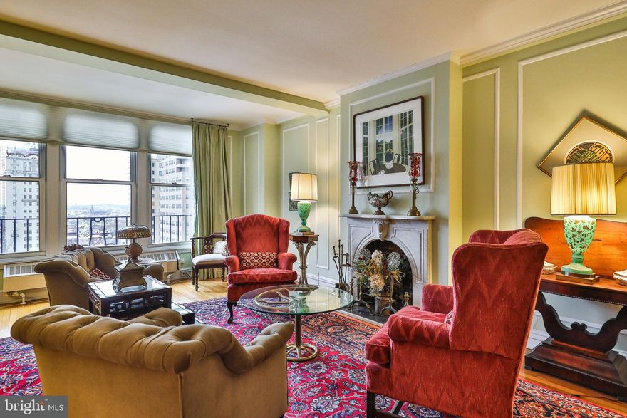 Picturesque tree top views of Rittenhouse Square are yours in this bright and beautiful 3 bedroom, 3 bath home in the Rittenhouse Plaza.  This extraordinary home offers hardwood floors and ornate moldings throughout. The entrance hall leads to a flex space, currently being used as a den.  Beyond this is the spacious living area complete with original hardwood floors featuring a mahogany inlay.  The exceptional views of Rittenhouse Square and the decorative fireplace make this elegant space perfect for entertaining but also a very cozy place to read and unwind.  To the left of the entry is the formal dining room for intimate or large gatherings. The spacious, light filled kitchen is a cooking lover's dream.    It is complete with a breakfast bar, granite and soapstone countertops, custom cabinetry with 2 pantries, 5-burner gas cooktop, stainless steel appliances, and tile backsplash.  Additionally, there is a buffet area with an abundance of counter and cabinet space perfect for prepping when hosting dinner parties.  Off the kitchen is a bonus room with a full-sized washer and dryer and storage galore. This home offers 3 generously sized bedrooms!  The east wing of the home includes 2 bedrooms that feature custom built-ins, large closets and en-suite baths. The corner bedroom features 3 windows with stunning views of the square! The second bedroom has an en-suite bath with a soaking tub. The west wing offers another large bedroom overlooking the park and with a view of the church. This bedroom has floor to ceiling built-ins and has access to the hall bathroom. Additional amenities include many closets throughout, and a personal storage locker located in the building’s lower level.  The Rittenhouse Plaza is a New York style, pre-war building entered from a beautifully landscaped garden. It is pet friendly and offers a 24-hour concierge as well as door attendants for both the courtyard and 19th street entries, an on-site management office and maintenance. The monthly co-op fee includes real estate taxes, Fios cable, internet, heat, water, sewer, and building maintenance. A one-time co-op transfer fee of 1% of the purchase price is paid at closing.  Step out of your front door into Rittenhouse Square where you're surrounded by upscale restaurants, casual eateries, shopping, museums and much more.