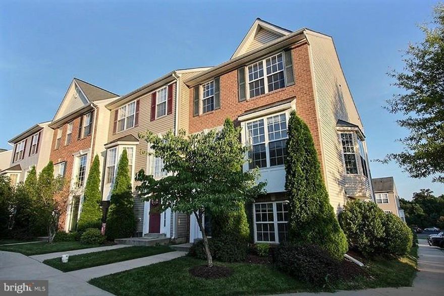 4BR, 3.5BA spacious end-unit th w/ walk-out basement, freshly painted, gourmet kitchen w/ gas cooktop, massive kitchen w/ island & adjoining rear deck, living room/dining room open to foyer, master suite w/ walk-in closet, sitting room & ensuite bath w/ separate shower & tub, upper level w/ 2 add bedrooms & bath. Lower level w/ large family/rec room, laundry, bedroom & full bath.