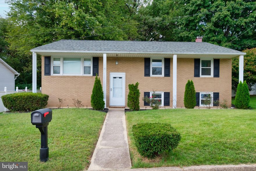 Seller will consider a credit for the installation of a driveway! Lots of upgrades in this 5 bedroom 2 full bath  split foyer in Ferndale Farms. The seller has taken care of all the big ticket items including roof (2016), Windows (2015), Kitchen (2021), HVAC (2021), basement full bath (2023). Beautiful hardwood floors on the upper level and new LVP flooring on the lower level. A truly amazing kitchen renovation, with quartz countertops, tile backsplash, pantry and a center island . Walk out the french doors and you will enjoy many summer days on the maintenance free deck which overlooks rear yard. The back yard backs up to trees which gives you lots of privacy. Large Jack and Jill style bathroom on the upper level could easily be converted into a 3rd bath if need be.  Fireplace has never been used by current seller so sold as is. Great location on a dead end street with an easy commute to NSA, Ft Meade, Baltimore, Annapolis and D.C.