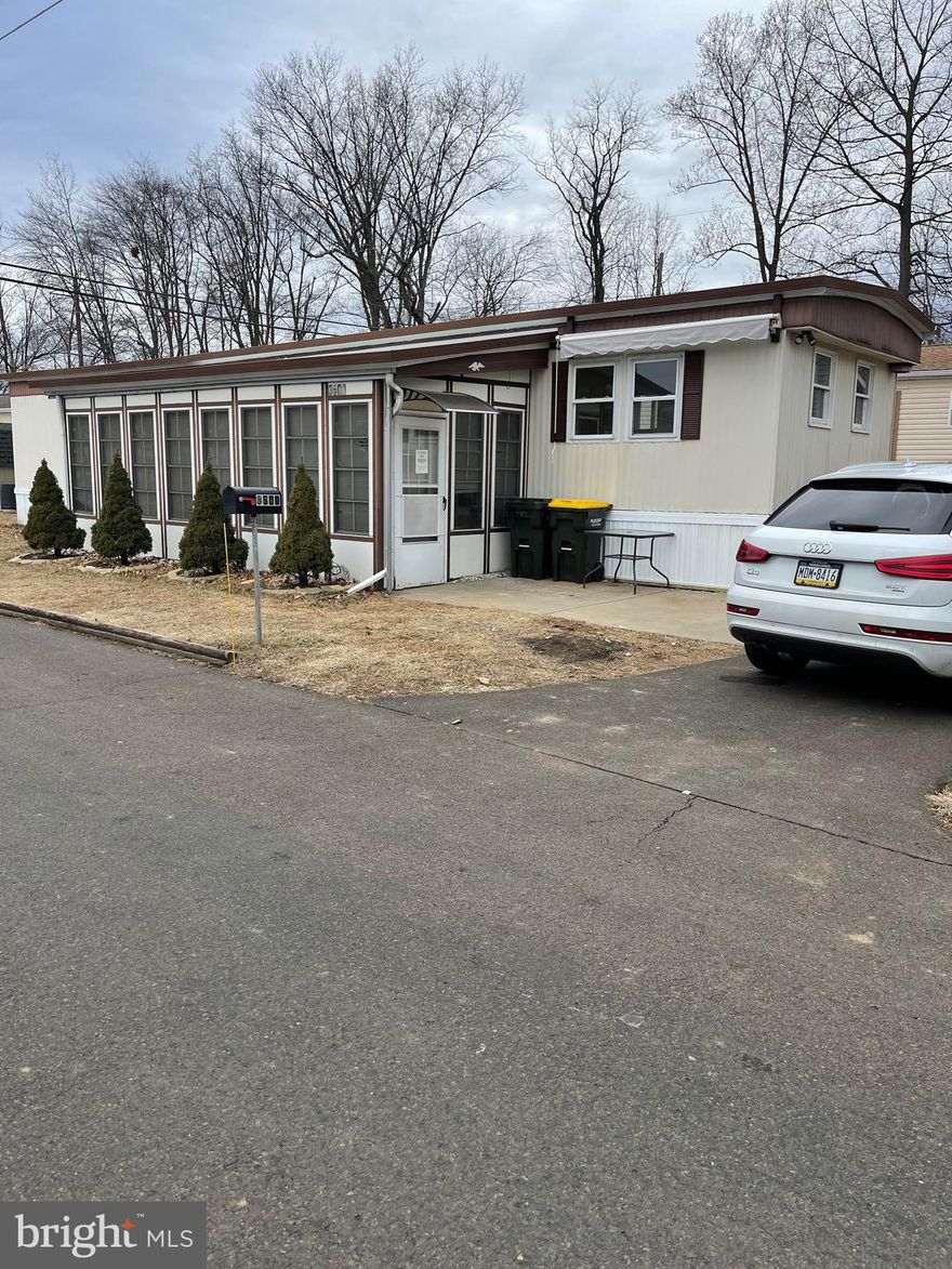 Affordable home in sought after Penn Valley Terrace. New kitchen will be finished shortly. Newer plumbing.  3 season room. New paint. New flooring. New appliances in kitchen. Any potential buyer must be approved by the community before an agreement will be executed. The application is attached. The requirements are a 700 or better credit score, pass a background check and verify your income. Lot rent is 840.00 a month and it includes cold water, sewer, trash & recycling pickup and snow removal on the streets.