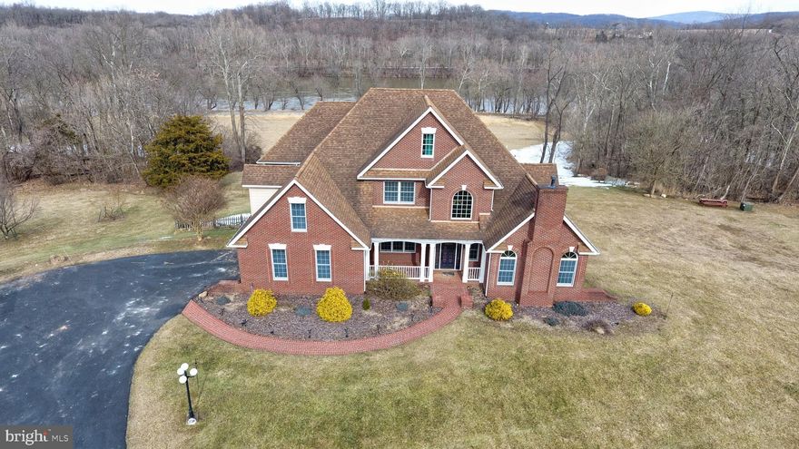 Agents, seller may be open to offering to pay for the hardware ($499) and the first years service ($99/ mo). For the new Starlink internet service that is now available in the area. This maybe the solution to the issue of internet service at the property. Welcome to your dream home! This immaculate 5 Bedroom, 4.5 Bath Brick Colonial rests on 24+ acres of beautiful scenery overlooking the Potomac River and backing protected farmland which can not be developed! Totaling 7000+ Sq. Ft. of living space on 3 finished levels, this home features a Main Level Primary Owner's Suite complete with Sitting Area with 3 sided gas fireplace, enormous walk-in closet, and luxurious bath with soaking tub, separate shower, and2 vanity stations. Additional Main level features include gleaming hardwoods, Cathedral Ceiling Family Room with Gas Fireplace, Formal Dining Room, Gourmet Kitchen with brand new stainless appliances, wall oven, granite counter tops, commercial grade gas cooktop, butler's pantry and adjoining breakfast room. Stunning Office with gas Fireplace perfect to work from home or virtual schooling! Upper level features 4 additional Junior Bedrooms with a wonderful Jack-N-Jill layout. Convenient Bedroom level laundry area. The lower level has an enormous Great Room, Game Room, Full Bath, Custom Storage Room, and an additional 4 rooms to fit a multitude of needs such as a home gym, additional guest bedroom, media room and more! Walkout level to the rear yard with house length deck partially screened in for all season views of the river! Parking is no problem at this estate with a 2 car attached side load garage as well as a 3 car detached garage with workshop and full apartment above! Apartment features a Living Room, Bedroom, Kitchen, and Bath- great income potential! 4 Stall Barn with run-in. 3 Run-in Sheds on the property and fenced pastures! Various fruit bearing trees line the property providing you with fresh peaches, pears, and apples! Close to historic Shepherdstown WV and minutes to Sharpsburg MD. This home truly must be seen to take in all the beauty it has to offer!