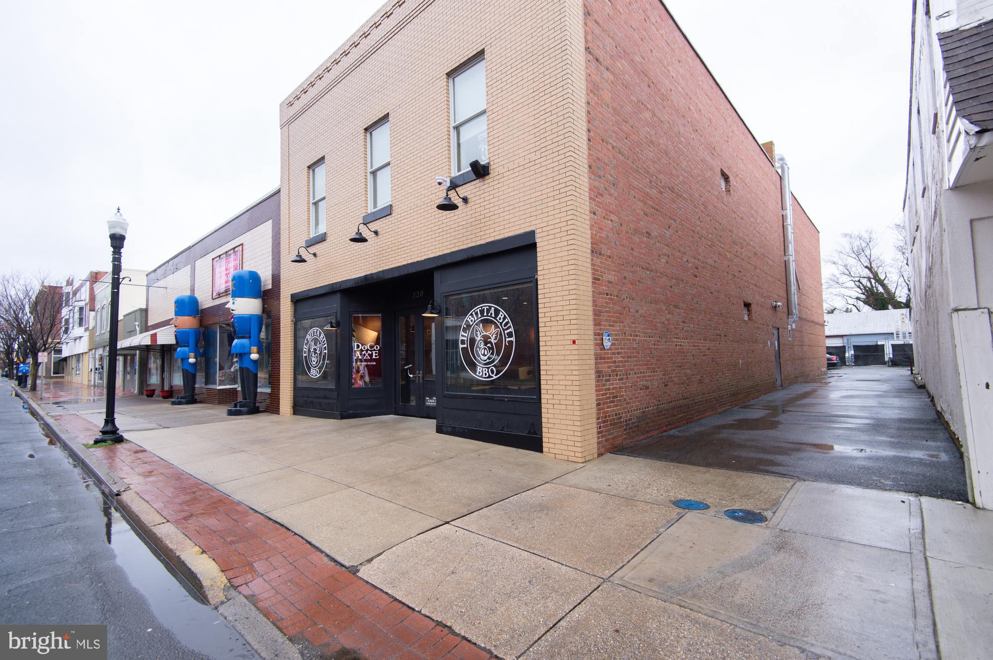 This meticulously renovated commercial building was transformed by current ownership into a restaurant with a high level of finish and a second floor lounge with many available activities.
- Features a full bar, restaurant seating, and an enormous game room on the second floor. 2 ADA bathrooms, office space, cameras throughout w/ DVR and live feed, 3 phase electric and a fifty pound interior grease trap.
- There are 4-5 deeded parking spaces and the restaurant is adjacent to a public parking lot.
- Licensed seating for 108 downstairs and 49 upstairs. Upstairs has axe throwing stations, golf simulator w/ 112 courses, shooting simulator with interactive courses and realistic pistols. Simulator also does cornhole, golf, soccer, frisbee golf and zombie dodgeball. There is also a VR Escape Room. Upstairs was previously leased by another party for 4k per month gross.
Owner financing is available, terms can be flexible.