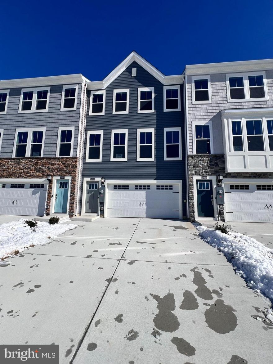 This MOVE-IN READY 3BR, 3.5BA, three-story Elmwood floorplan delivers 2,263 square feet of thoughtfully designed living space—plus a spacious 2-car garage with automatic opener for everyday convenience.

The first floor welcomes you with a large recreation room, ideal for entertaining or unwinding, with direct access to an inviting outdoor area. Head upstairs to the true heart of the home: a show-stopping entertainer’s kitchen featuring Frigidaire® stainless steel appliances, custom staggered cabinetry with crown moulding, granite countertops, and a clever roll-out shelf for hidden recycling and trash bins.

The open-concept layout seamlessly connects the kitchen, dining area, and Great Room—perfect for hosting unforgettable gatherings. Designer touches are everywhere, from durable vinyl plank flooring in the main living areas to harmonizing paint schemes and plush carpeting in the bedrooms.

The top floor offers two secondary bedrooms and a luxurious owner’s suite with a walk-in closet and spa-inspired bath, complete with dual sinks, a walk-in shower, and granite countertops. Smart home features—including a Ring Video Doorbell Pro, WiFi thermostat, and smart front door lock—add modern convenience and peace of mind.

Homes with this layout, finish level, and smart features don’t last—schedule your tour today!

Set in the heart of Millsboro, this home has easy access to shopping, dining, championship golf, and Delaware’s celebrated coastal destinations. With a two-car garage, curated upgrades throughout, and immediate availability, this is a rare opportunity to own a move-in-ready home in one of Sussex County’s most sought-after locations. Schedule your private tour today.

Enjoy a lifestyle filled with golf, pools, a clubhouse, fitness center, trails, and regular community activities.

Let us show you around so you can see firsthand the lifestyle that awaits you. Schedule your tour today!

***Photos are for illustrative purposes only and from a model home of same floorplan. Please see new home consultant for details and final finishes. If using a Realtor, clients must acknowledge their representation during their first interaction with Lennar, AND the Realtor must accompany them on their first visit. Appointments are highly encouraged to maximize your customer experience! Taxes assessed after settlement. Please visit model home for open house access.***