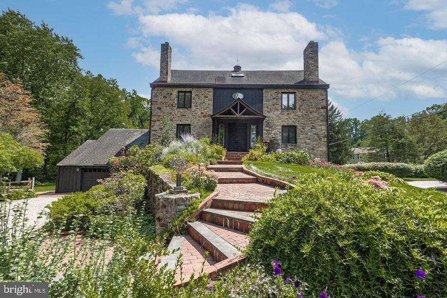 A stunning example of a historic relic given new life and purpose. Lovingly and skillfully crafted, this converted barn offers classic Bucks County charm and character with wonderful spaces set amongst a private, scenic backdrop. This enchanting property showcases brilliant stonework on the interior and exterior, hand-hewn beams, wide plank wood flooring, Mercer tiles, stained glass accents and 4 levels of fantastic living space. The historic elements are complemented by an array of modern-day amenities including a convenient laundry chute, central vac system, high velocity air conditioning, 2 car garage with workshop, gorgeous in-ground pool with spa, custom gazebo, romantic dining terraces and a beautiful paver driveway. Featuring glorious views of nature with shade and specimen gardens, wooded trail to a stream and stone walls, this tranquil location is unparalleled, convenient to the quaint shopping and dining of Peddler’s Village, Doylestown and New Hope. An ideal country retreat within a stone’s throw of entertainment and activities for all. A truly unique and wonderful living experience!