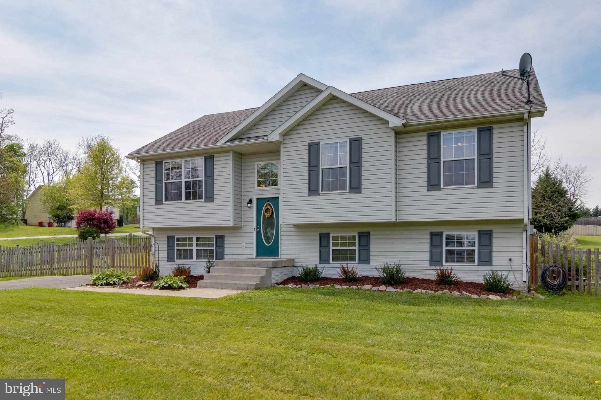 Beautiful split foyer on a premium corner lot. 5 Bedroom home with 2390 spacious sq ft. Upgraded kitchen with stainless steel appliances, granite countertops, and hardwood floors. Large family room and dining area. Fully finished walk out basement with an additional Rec room, 2 bedrooms, and 1 full bath. HVAC system replaced 2 years ago. Great commuter location!