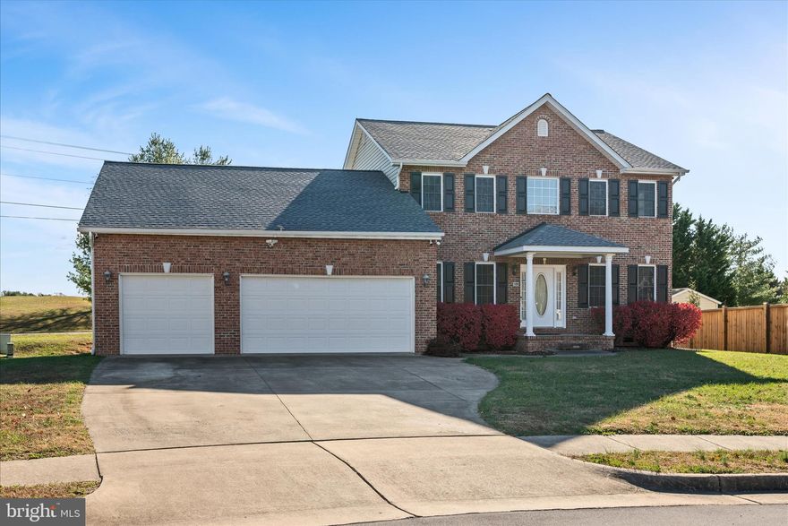 What a BEAUTY!!   Open Sunday  11/23 from Noon - 2:00PM.  5-bedroom, 3.5-bath home with a 3-car garage on a cul-de-sac in Stephens City. Main-level primary bedroom with expanded walk-in closet. Features include an elegant marble-floor entry, powder room and primary bath, plus two fireplaces—a triple-sided fireplace in the family room and a double-sided gas fireplace serving the primary bedroom and bath. Upgrades include crown molding throughout, exterior security cameras with monitor, new kitchen tile flooring (2025), roof (2022), Lennox HVAC (2019), water heater (2021) and deck (2020). The full basement offers excellent finishing potential. Lot 3A to the left of the home is common area and cannot be built on, providing additional open space.   Just 1.4 miles to Sherando High School, and less than that to the local grocery store, ICE CREAM, and other retail stores.    Please remove shoes or use provided coverings to protect the marble flooring.