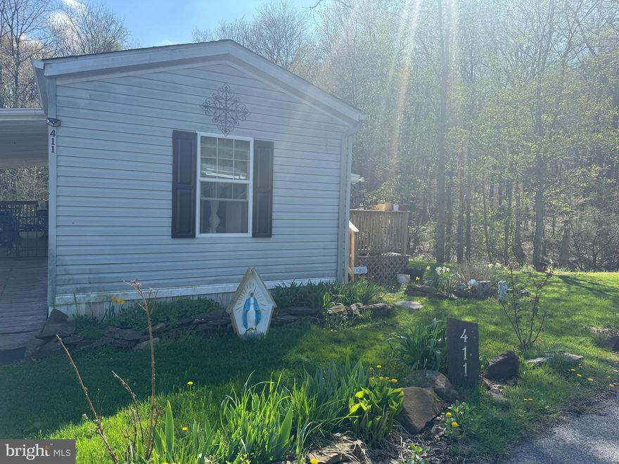 Welcome to this charming 3-bedroom, 2 full bathroom mobile home, perfectly situated in a nice and quiet neighborhood. Tucked away at the end of the road, this property offers added privacy and a peaceful setting—ideal for those looking to escape the hustle and bustle.

Inside, you'll find a comfortable and functional layout with a spacious living area that flows into the kitchen and dining space, creating a welcoming environment for everyday living and entertaining. The home features three well-sized bedrooms, including a primary suite with its own full bathroom for added convenience.

Step outside to enjoy your own private driveway and the extra sense of space that comes with this end-of-road location. Whether you're relaxing at home or hosting guests, you'll appreciate the tranquility and privacy this property provides.

A great opportunity for comfortable and affordable living—don’t miss your chance to make this home yours!