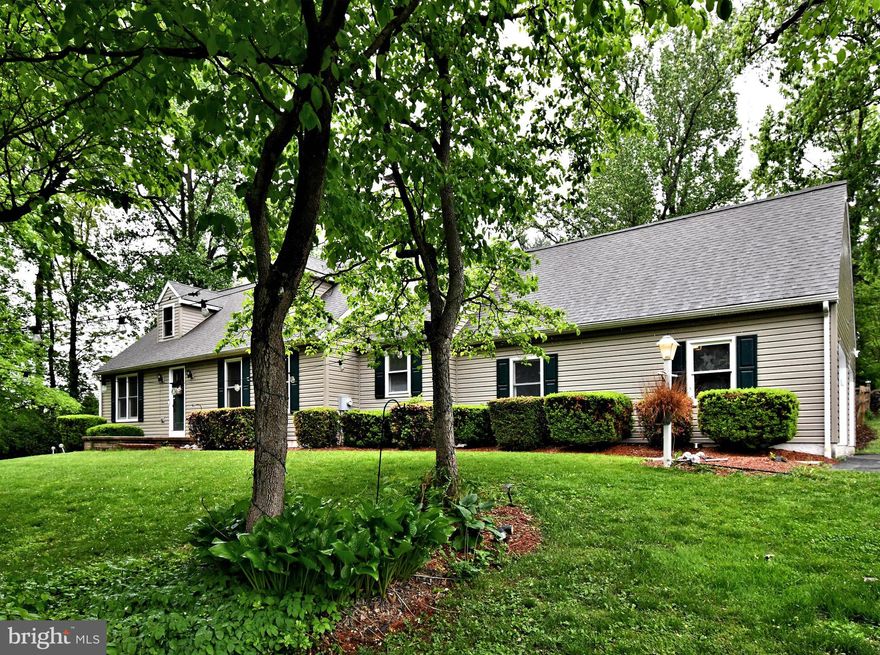 WELCOME HOME! Tucked away on a picturesque, tree-lined driveway in the heart of Chester County, this home offers the ultimate private retreat on over 3 beautifully landscaped acres with stone walls, an in-ground pool, two storage sheds, and a fenced backyard featuring a serene wooden deck—your own slice of paradise just minutes from shopping, dining, and the PA Turnpike. This stunning two-story cape boasts a bright and airy main level with two spacious bedrooms and a fully renovated bath with a double-sink vanity. The updated kitchen shines with granite countertops, tile backsplash and flooring, and opens to a generous mudroom with its own bathroom and laundry. A deep garage offers ample space for vehicles and storage. Upstairs, the primary suite stuns with gleaming floors, a large walk-in closet, and a luxurious en suite bath with an oversized vanity, gorgeous tile, and a spa-like walk-in shower. An additional room upstairs offers flexibility for an office, nursery, or guest space. The fully finished lower level provides endless opportunities for entertaining, hobbies, or creating the ultimate rec space. Just a short drive to Marsh Creek State Park, charming downtown Downingtown, and top-rated schools, this home blends quiet country living with unbeatable access to local amenities—schedule your tour today!