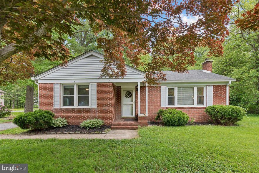 Welcome to 319 Gambrills Road — a charming and thoughtfully updated all-brick rancher situated on a spacious .48-acre corner lot in the heart of Gambrills. Blending classic mid-century character with modern-day comfort, this lovingly maintained home offers flexible living spaces, extensive updates, and a backyard built for relaxing and entertaining.
Inside, natural light pours through the large bay windows, creating a warm and inviting atmosphere throughout the main living spaces. The remodeled kitchen, updated in 2018, features stainless steel appliances, luxury vinyl plank flooring, and a functional layout perfect for everyday living and entertaining alike. Fresh paint and tasteful updates throughout the home complement its original charm while maintaining the character that makes this property so special.
The main level includes three bedrooms, highlighted by a spacious primary suite with a beautifully updated en-suite bath completed in 2021, featuring large-format ceramic tile flooring and a walk-in closet. Two additional bedrooms share a full bath that offers an excellent opportunity for customization and finishing touches. Just off the kitchen, a flexible bonus space can easily serve as a formal dining room, family room, home office, or even an extension of the primary suite.
Outside, the fully fenced backyard creates a peaceful retreat with mature trees providing shade and privacy. The expansive yard offers plenty of room for entertaining, gardening, pets, or play, while two storage sheds and a detached two-car garage with its own driveway add exceptional functionality and storage space.
The unfinished basement has been waterproofed and provides abundant potential for future living space, workshop areas, or additional storage. Major updates include a roof replacement with architectural shingles in 2018, basement waterproofing in 2018, living room windows replaced in 2017, and a brand-new hot water heater installed in 2024.
Conveniently located with quick access to Routes 32, 97, 100, and Route 3, this home offers an easy commute to Annapolis, Baltimore, Fort Meade, and Washington, D.C. Nearby shopping, restaurants, parks, and schools add to the appeal of this quiet and established setting.
Lovingly maintained and full of character, 319 Gambrills Road is a unique opportunity to own a home with space, charm, and endless potential.