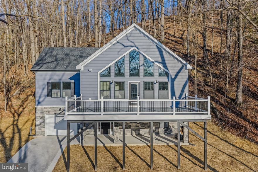 True Waterfront property and ready for immediate delivery; Perched to capture breathtaking views in one of the most scenic areas of the Eastern Panhandle, 191 Shenandoah Ranch Rd is a stunning true waterfront new construction opportunity offering the perfect blend of modern design, comfort, and location. Featuring 3 bedrooms, 2.5 baths, and an open, airy layout, this home was thoughtfully designed to let the surroundings take center stage—whether you’re sipping coffee at sunrise or unwinding at the end of the day. Inside, you’ll love the fresh, contemporary feel with bright natural light, stylish finishes, and a functional floor plan that makes everyday living and entertaining feel effortless. The main level flows beautifully with spacious living and dining areas, while the bedroom layout provides flexibility for guests, remote work, or additional living space. Whether you’ve been dreaming of a private riverfront retreat or you’re looking for an income-producing short-term rental option in the highly sought-after Harpers Ferry area, this property offers the kind of potential that’s hard to find—especially in a brand-new build. A rare combination of new construction + incredible views + versatile use, this is a home you truly have to experience in person to appreciate. Call today to schedule your tour and come see what makes this one so special.