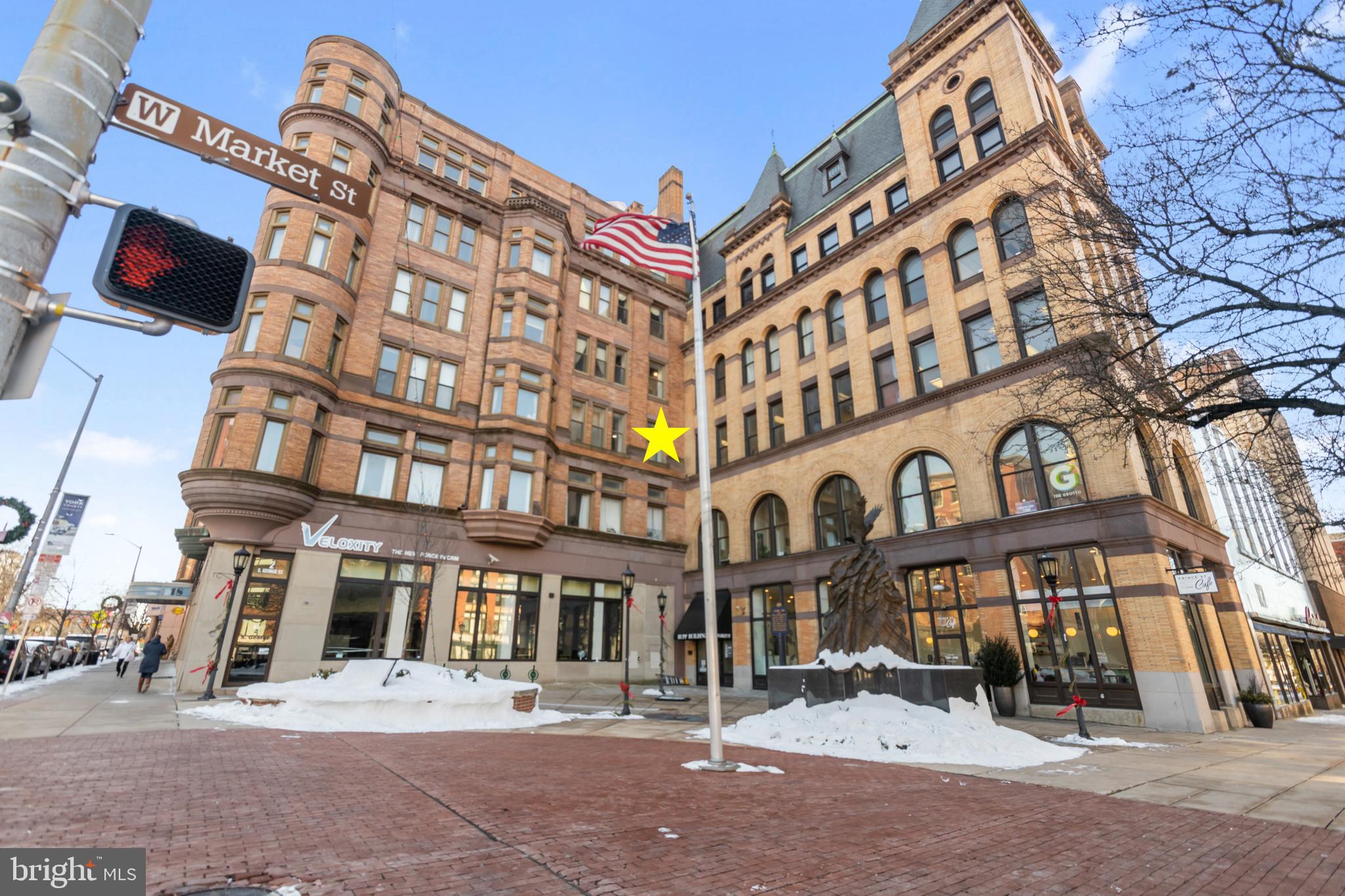 Welcome to 18 S George Street unit #34 in York! This beautifully renovated condo offers the perfect blend of luxury, modern amenities, and the charm of small-town living, all nestled in the heart of downtown. With an abundance of high-end updates, this home is ideal for those who enjoy the convenience and vibrancy of city living while still seeking a peaceful and stylish retreat. Located on the highly sought-after 3rd floor, this unit is directly connected to the parking garage through an enclosed breezeway, making trips a comfortable, especially in inclement weather. The scenic views of downtown from the living room windows provide a perfect backdrop for this centrally located property, just steps away from trendy nightlife, highly rated restaurants, bars, a yoga studio, and performing arts venues like the Appel Performing Arts Center. The York revolution baseball stadium is also just a short walk away. The kitchen boasts a GE Cafe double oven with an induction cooktop, Bosch 800 Series dishwasher, and a Koolmore low-profile energy efficient microwave. The Cambria Portrush countertops, custom-cut to flow seamlessly into the kitchen windowsill, add a touch of elegance. The Zline stainless luxury sink comes with handy accessories like a cutting board, vegetable tray, drying rack, and a powerful 3/4 hp garbage disposal. High definition polished porcelain flooring was just installed in the entry hall and kitchen. The primary bedroom is spacious with a generous size closet and full master bath. The 2nd bedroom is spacious with a generous closet with newly installed closet system. The condo’s master and guest bathrooms have been thoughtfully updated with new LVP slip-resistant flooring, medical-grade gloss ceiling tiles that resist stains and mold, and high-efficiency Panasonic high 150 cfm whisper quiet exhaust fans. The guest and master bathrooms feature new toilets, vanities, and energy-star-rated fixtures. Enjoy the comfort of professionally cleaned carpets, refinished cabinets, and wood flooring throughout the living room and hallways. Brand new Electrolux high efficiency ultra quiet washer and dryer units are located inside the condo - trips to the laundromat / waiting on shared laundry are a thing of the past! Fresh paint from ceiling to floor trim and LED energy-saving lighting throughout the home further elevate its modern, sophisticated atmosphere. With its extensive updates and prime location, this condo offers a worry-free, move-in-ready living experience that will last for years to come.