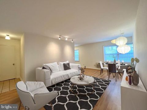 Photo of 4803 Wellington Drive #103, Chevy Chase, MD 20815 (MLS # MDMC2117658)