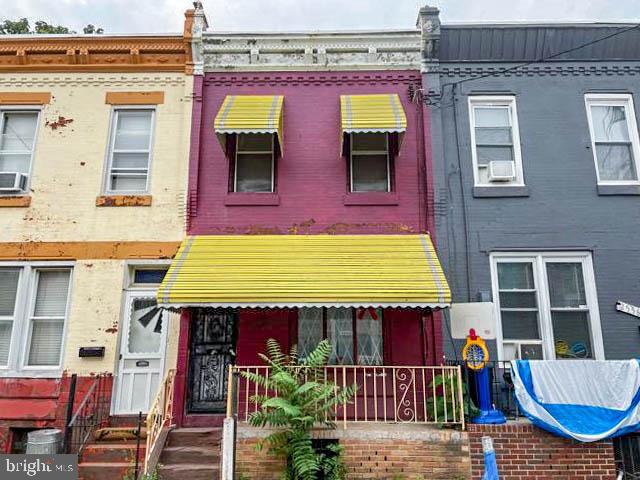 Customize this 3-bedroom, 1-bath brick row home to your liking! With approximately 1,042 square feet of living space and a relaxing porch, there is great potential in this property. Don't miss out on the opportunity to make this home exactly how you want it. Being sold AS IS, WHERE IS, Buyer is responsible for all inspections. All information and property details set forth in this listing, including all utilities and all room dimensions, are approximate, are deemed reliable but not guaranteed, and should be independently verified if any person intends to engage in a transaction based upon it. Seller/current owner does not represent and/or guarantee that all property information and details have been provided in this MLS listing. DO NOT Approach the occupants, exterior drive-by showing ONLY!!