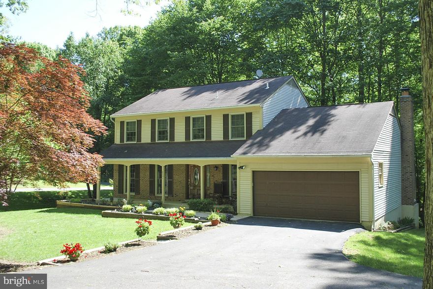 Gorgeous home on fantastic lot. Don't miss this beautiful home filled with tons of upgrades and updates! Large front living room with elegant dining room. Renovated kitchen with updated cabinets and granite counters. Attached family room opens to deck where you can sit and enjoy the wooded backyard. 5th Bedroom NTC. Finished walk out basement. New roof and siding being installed soon.