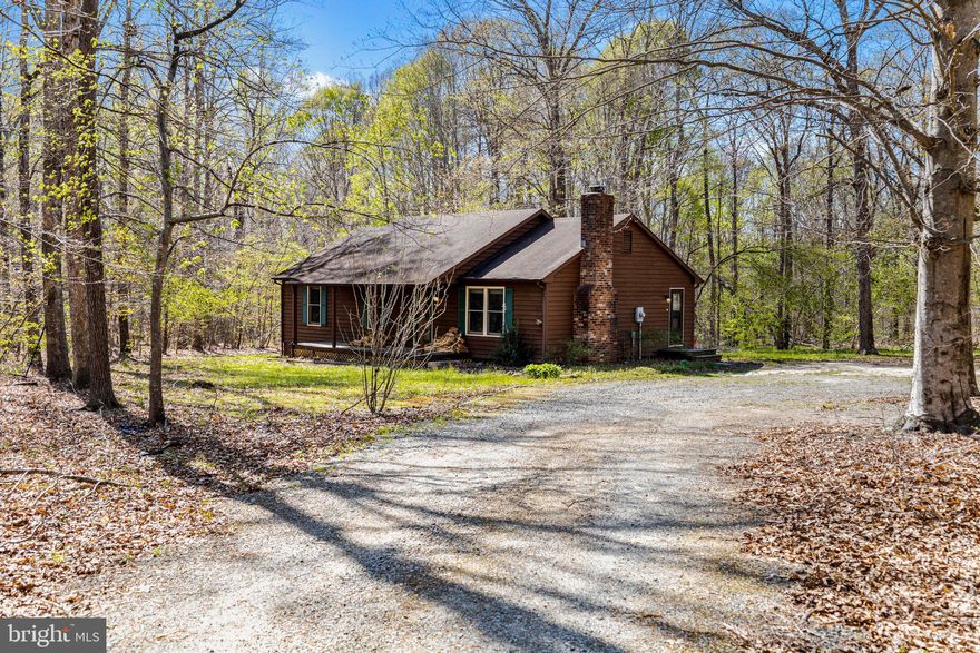 Theres no place like home and here you will be HOME!!! This private setting cedar sided 3 bedroom 2 bath home with wood floors is located within 30 minutes to the Richmond Metropolitan area and 10 minutes to I-64 whereas you can hop on the interstate and get to Charlottesville or Richmond. Can we say great location? Wood burning fireplace in large living room. Kitchen has all appliances and a large pantry. Enjoy country living at its best.