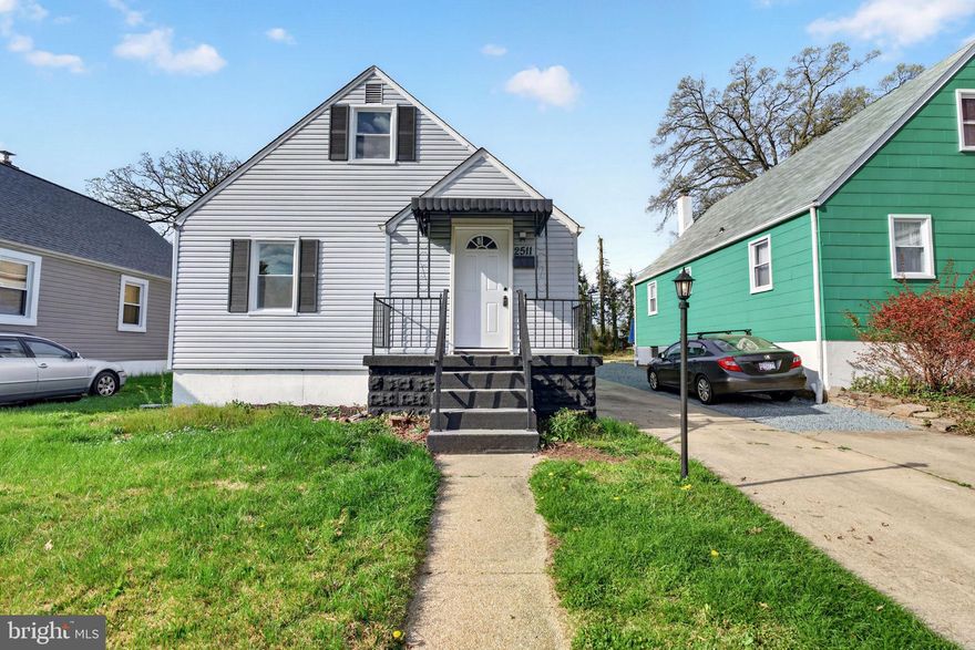 Welcome to 2511 Wentworth Road, where classic Cape Cod charm meets fresh, modern updates in a prime Parkville location. This inviting 3-bedroom, 1.5-bath home has been thoughtfully refreshed and is ready for its next owner. Inside, the main level offers a bright and functional layout with durable laminate plank flooring, two comfortable bedrooms, and a fully renovated bath featuring a custom-tiled shower. The kitchen has been tastefully updated with white cabinetry, modern countertops, stainless steel appliances, and a stylish backsplash that ties it all together. Upstairs, the spacious upper-level bedroom includes its own half bath, creating a flexible retreat that works beautifully as a primary suite, guest space, or private office. The finished lower level expands your living space with a warm and inviting setting, complete with a gas fireplace, perfect for relaxing nights in or casual entertaining. Outside, enjoy a fully fenced backyard with a patio designed for entertaining or unwinding, along with a private driveway for easy off-street parking. Conveniently located near everyday shopping, dining, and commuter routes, and within walking distance to Hillcrest Swim Club, this home delivers an easy, connected lifestyle with all the right updates already in place. Major updates include: Windows, HVAC, Kitchen, Flooring, and Paint.