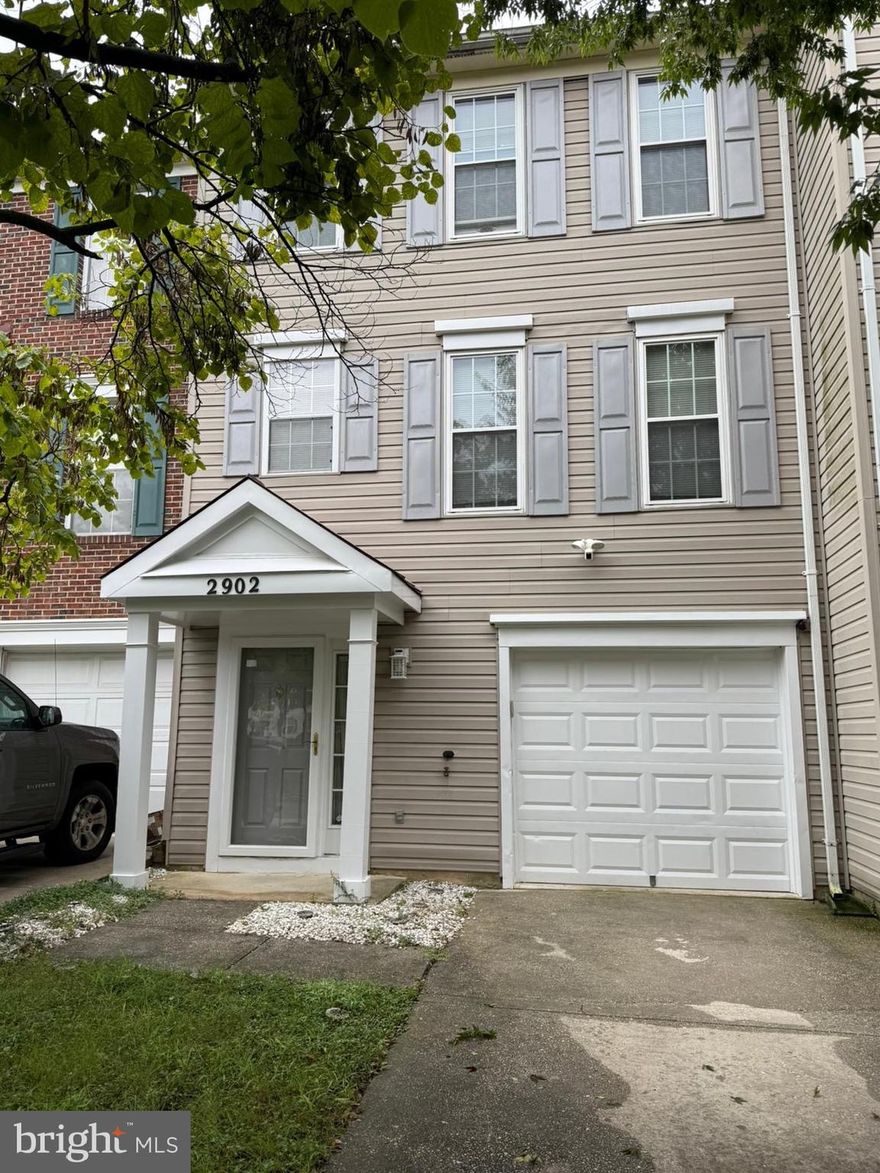 Gorgeous 3 bedroom, 2 full, 2 half bathrooms garage townhome. Features include inside access to the garage. recreation room, powder room, laundry and walk out to patio in a fenced backyard.  The 2nd level has luxury laminate plank flooring, open floor plan living and dining rooms and powder room.  Gourmet eat-in kitchen with sliding glass doors to deck, stainless steel appliances and pantry complete this floor.  Upper level has a large primary suite with bathroom and large walk in closet as well as 2 other bedrooms and a hallway bath.  This home is conveniently located a few blocks off of Pennsylvania Avenue.  Easy access to 95/495 short commute to Andrews AFB