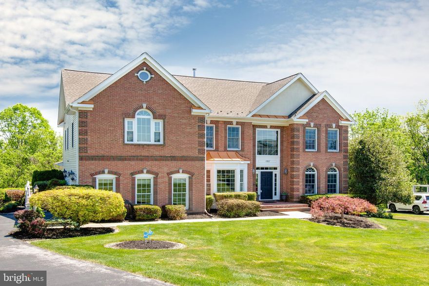 Nestled in the sought-after River Downs community, this exceptional home offers the perfect blend of comfort, style, and outdoor living. Bright and airy interiors feature a flowing layout ideal for both everyday living and entertaining. The beautifully renovated kitchen showcases granite countertops, a unique hammered copper farmhouse sink, and upgraded stainless steel appliances. Soaring ceilings and a dramatic stone fireplace highlight the spacious family room. The upper level includes four generously sized bedrooms, highlighted by an expansive primary suite designed for relaxation. The fully finished walk-out lower level offers incredible flexibility with a recreation area, additional bedroom, full bath, and extra room ideal for a gym, office, or playroom. Outdoor living is truly unmatched with a large deck overlooking a stunning private backyard retreat. Enjoy the gorgeous saltwater in-ground pool with premium PebbleTec finish, surrounded by an extensive brick paver patio This home delivers luxury, space, and a fantastic neighborhood setting all in one.