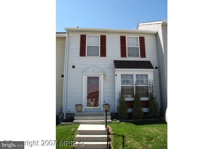 Come and see this nice TH Hampstead in Small Crossings development. Needs a little TLC but a little will go a long way to make this a great home! Wood burning fireplace in LR,the large kitchen needs appliances, the other rooms need some paint and possibly new carpet. There is a 1/2 bath on the 1st level, a finished basement room and a rear deck. Sold as-is.