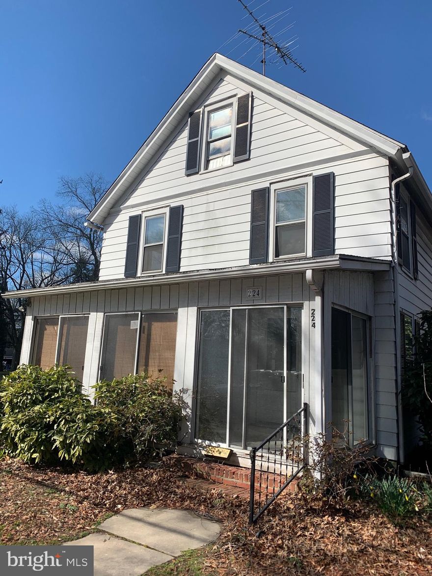 Fantastic investment! Home abounds with classic character! Needs some TLC but could be a charming home! Third floor attic would make great expansion! Attached mud room & carport! Nice brick patio! Beautiful original hardwood floors throughout! Tile sun porch lines the front of home! Quiet street in town could walk to park and in town amenities! Motivated sellers!